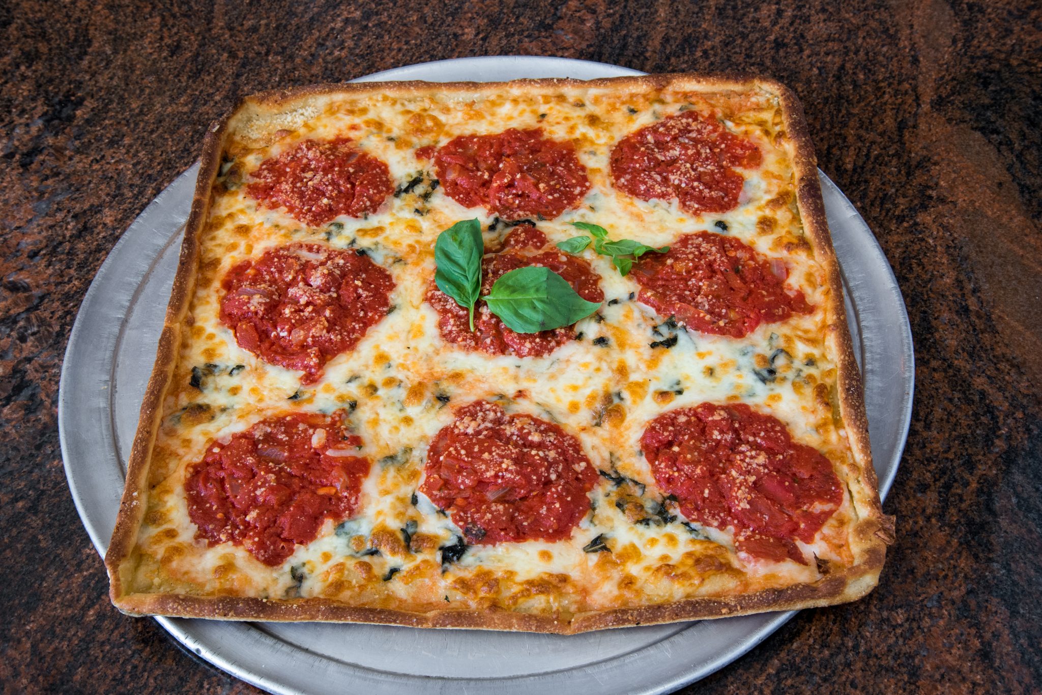 Tuesdays Only! Buy one large get one half off – Stromboli's Pizza